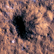 A recent impact crater on Mars, seen by the MRO's HiRise camera.